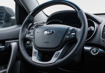 Подержанный автомобиль Kia Sorento 2015 года (15 фото)