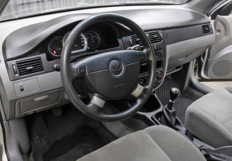 Подержанный автомобиль Daewoo Gentra Sedan 2013 года (15 фото)