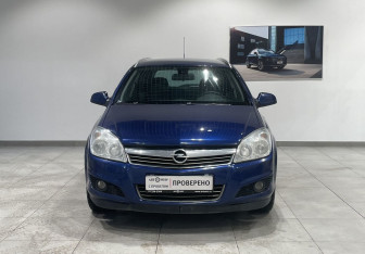 Подержанный автомобиль Opel Astra Wagon 2011 года (2 фото)