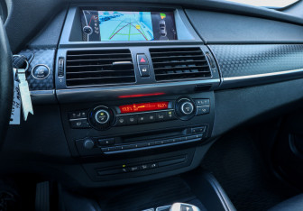 Подержанный автомобиль BMW X6 2010 года (19 фото)