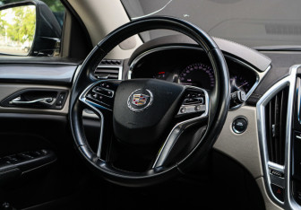 Подержанный автомобиль Cadillac SRX 2014 года (11 фото)
