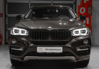 Подержанный автомобиль BMW X6 2016 года (2 фото)