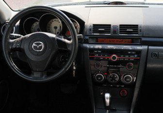 Подержанный автомобиль Mazda 3 Hatchback 2008 года (10 фото)