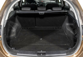 Подержанный автомобиль Kia Ceed Wagon 2015 года (13 фото)