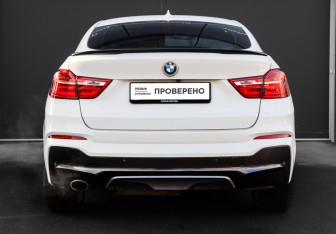 Подержанный автомобиль BMW X4 2015 года (5 фото)