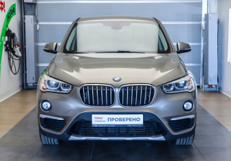 Подержанный автомобиль BMW X1 2016 года (2 фото)