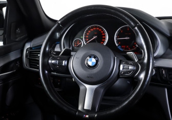 Подержанный автомобиль BMW X6 2018 года (13 фото)
