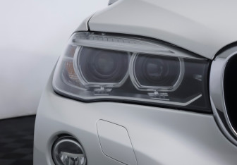 Подержанный автомобиль BMW X6 2016 года (19 фото)