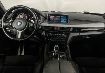 Подержанный автомобиль BMW X6 2018 года (12 фото)