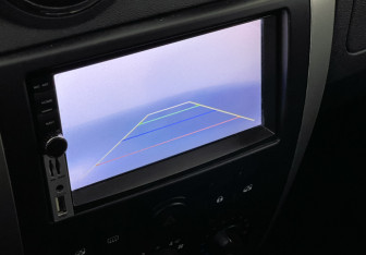 Подержанный автомобиль Nissan Almera Sedan 2013 года (14 фото)