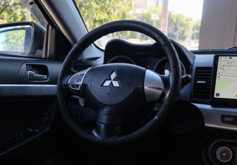 Подержанный автомобиль Mitsubishi Lancer Sedan 2008 года (11 фото)