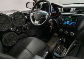 Подержанный автомобиль Kia Rio Sedan 2015 года (10 фото)