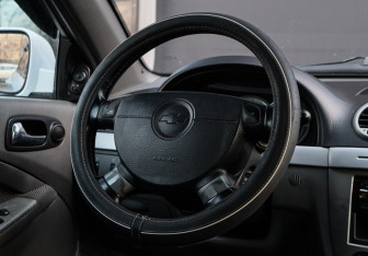 Подержанный автомобиль Chevrolet Lacetti Hatchback 2011 года (11 фото)