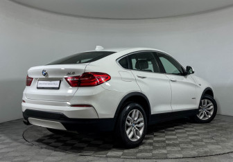 Подержанный автомобиль BMW X4 2015 года (2 фото)