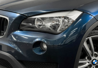 Подержанный автомобиль BMW X1 2014 года (8 фото)
