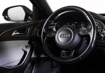 Подержанный автомобиль Audi A6 allroad 2012 года (12 фото)