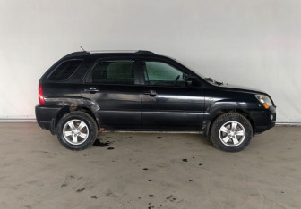 Подержанный автомобиль Kia Sportage 2010 года (7 фото)