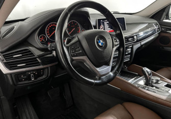 Подержанный автомобиль BMW X6 2016 года (12 фото)