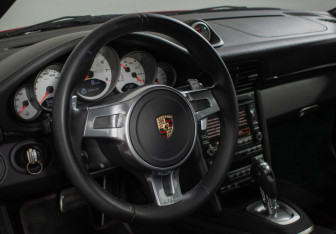 Подержанный автомобиль Porsche 911 Coupe 2010 года (22 фото)