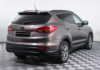 Подержанный автомобиль Hyundai Santa Fe 2013 года (3 фото)