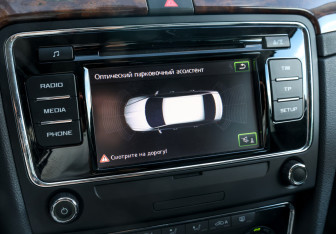 Подержанный автомобиль Skoda Superb Liftback 2014 года (18 фото)