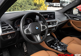 Подержанный автомобиль BMW X4 2024 года (10 фото)