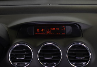 Подержанный автомобиль Peugeot 308 Wagon 2010 года (18 фото)