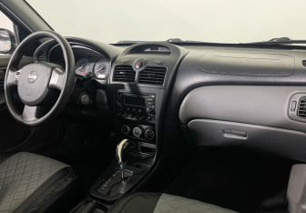Подержанный автомобиль Nissan Almera Classic 2012 года (9 фото)