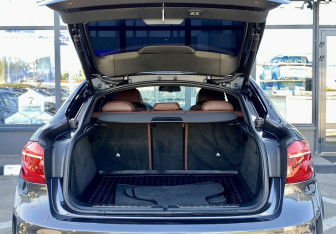 Подержанный автомобиль BMW X6 2014 года (10 фото)
