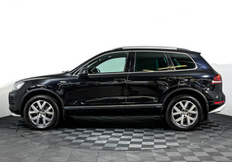 Подержанный автомобиль Volkswagen Touareg 2014 года (8 фото)