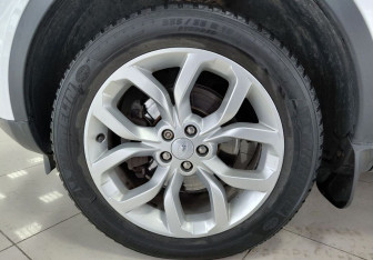 Подержанный автомобиль Land Rover Discovery Sport 2015 года (18 фото)