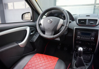Подержанный автомобиль Nissan Terrano 2016 года (12 фото)