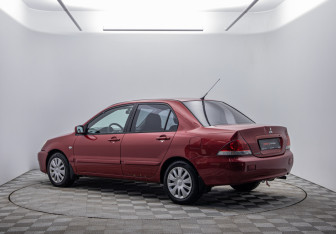 Подержанный автомобиль Mitsubishi Lancer Sedan 2006 года (7 фото)