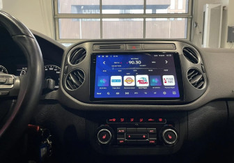 Подержанный автомобиль Volkswagen Tiguan 2014 года (16 фото)