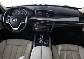 Подержанный автомобиль BMW X5 2014 года (11 фото)