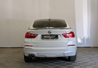 Подержанный автомобиль BMW X4 2015 года (6 фото)
