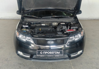 Подержанный автомобиль Kia Cerato Sedan 2013 года (18 фото)