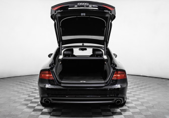 Подержанный автомобиль Audi A7 2014 года (14 фото)