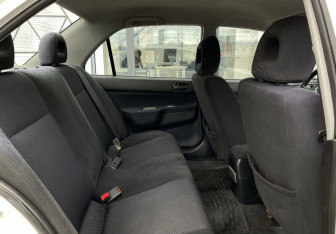 Подержанный автомобиль Mitsubishi Lancer Sedan 2009 года (19 фото)