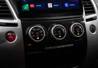 Подержанный автомобиль Mitsubishi Pajero Sport 2014 года (20 фото)