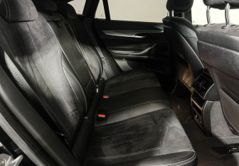 Подержанный автомобиль BMW X6 2018 года (14 фото)