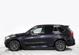 Подержанный автомобиль BMW X5 2015 года (8 фото)