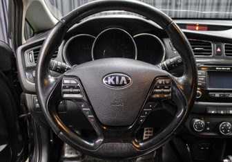 Подержанный автомобиль Kia Ceed Hatchback 2014 года (17 фото)