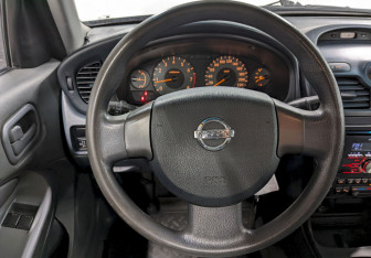 Подержанный автомобиль Nissan Almera Classic 2007 года (24 фото)