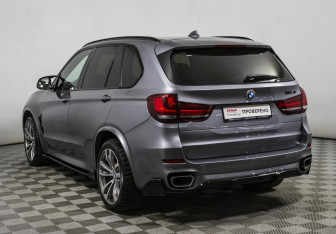 Подержанный автомобиль BMW X5 2015 года (7 фото)