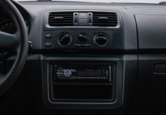 Подержанный автомобиль Skoda Fabia Hatchback 2012 года (14 фото)