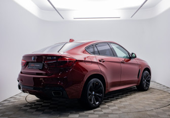 Подержанный автомобиль BMW X6 2015 года (5 фото)