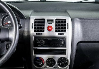 Подержанный автомобиль Hyundai Getz 2010 года (11 фото)