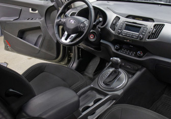 Подержанный автомобиль Kia Sportage 2012 года (9 фото)