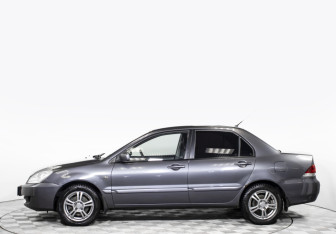 Подержанный автомобиль Mitsubishi Lancer Sedan 2009 года (8 фото)
